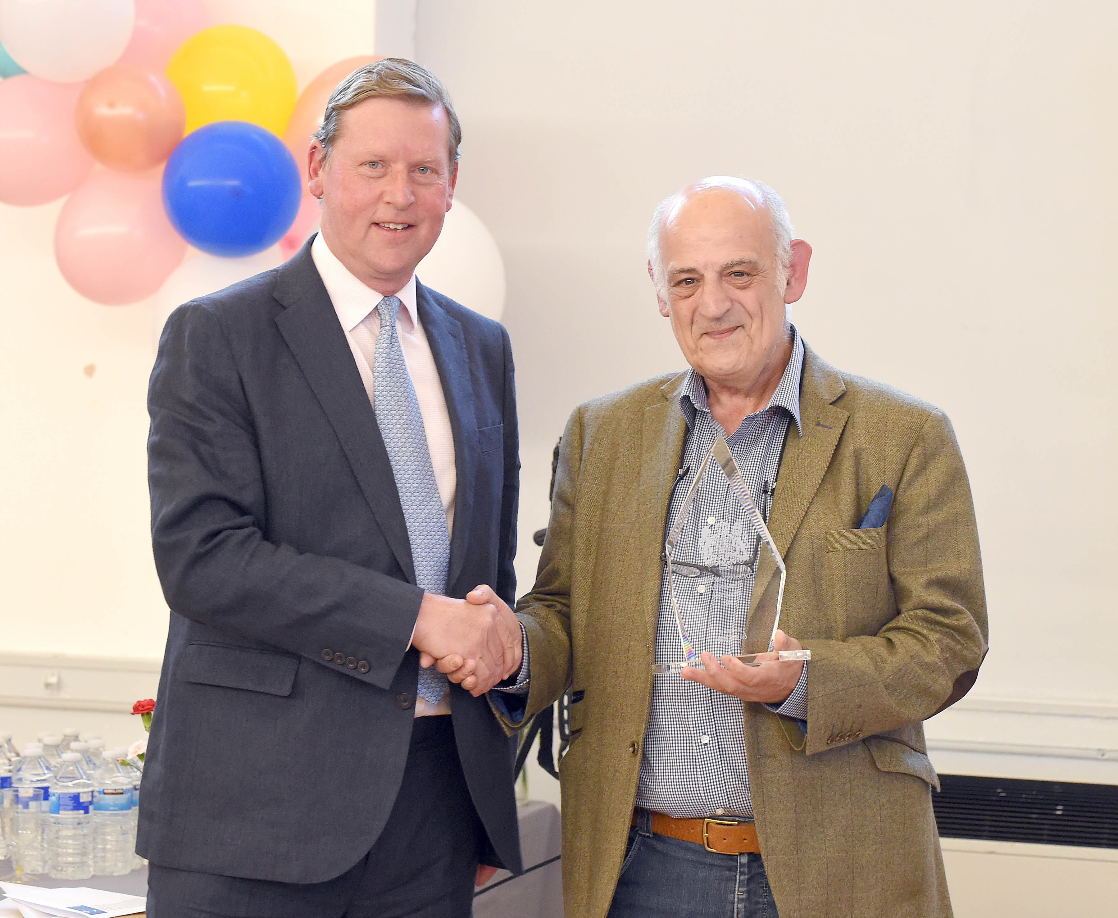 First Community Champion Kenny Quinn receives his award from Lord Lieutenant Johnny Stewart