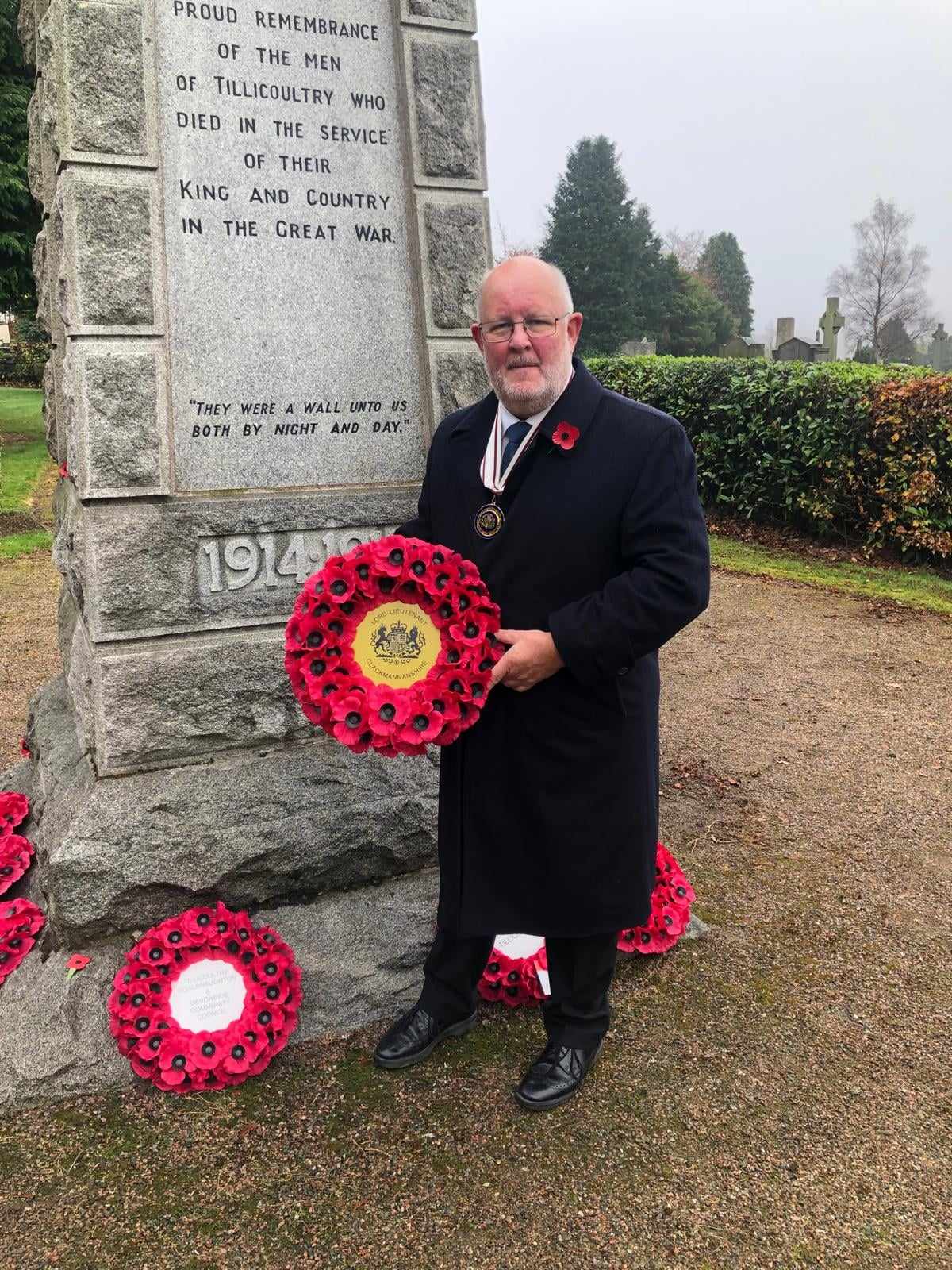 Clerk to the Lieutenancy, Craig Dunbar, lays the Wreath at Tillicoultry War Memorial