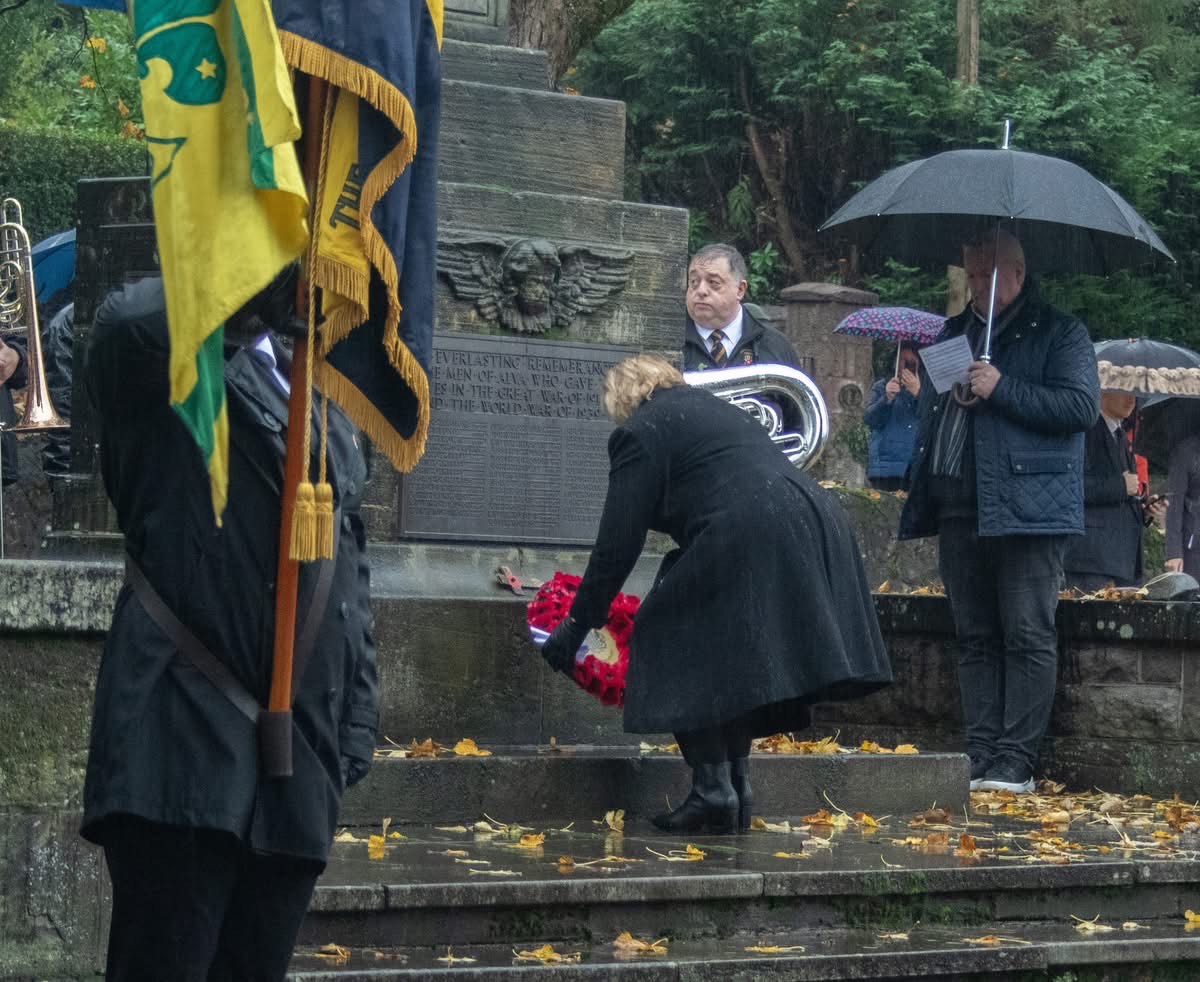 Deputy Lieutenant Anne  Spruce lays the Lieutenancy Wreath in the Johnstone Park in Alva