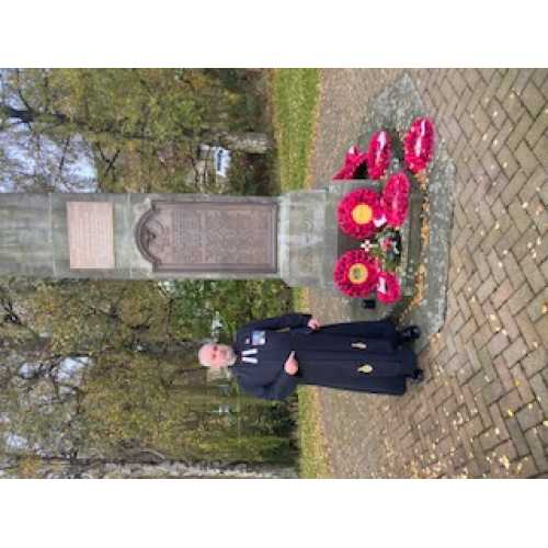 Rev. Mike Goodison at the Menstrie Memorial after the ceremonies had concluded